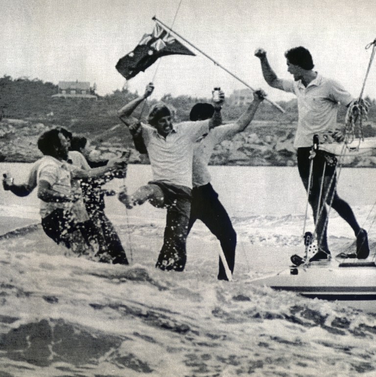 Australian crew members celebrate on their way back to Newport Harbor, image from the NHS collections.